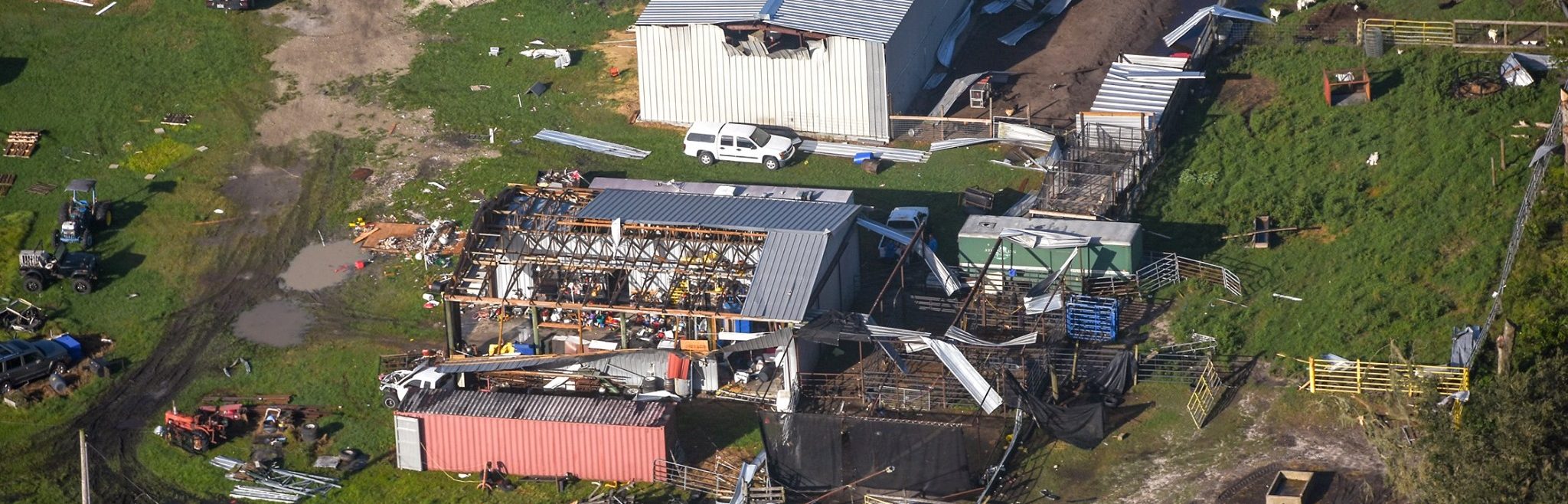 Farm structures with tornado damage.